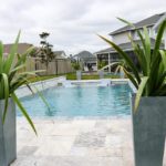 gradual entry pool with lounge chairs